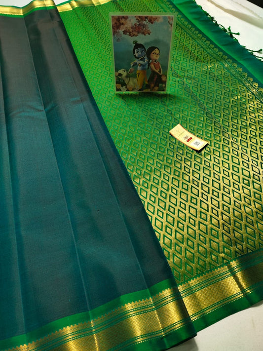 Dark green Pure kanchipuram plain silk sarees