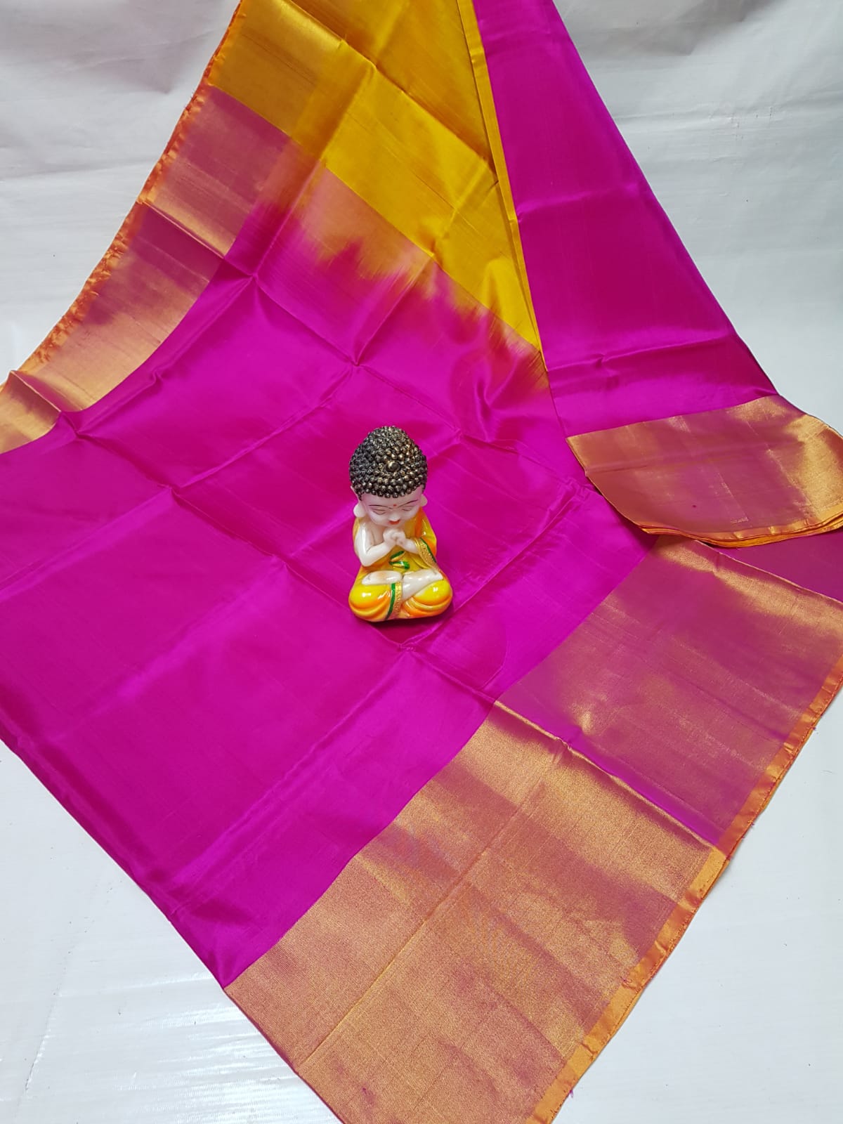 Dark pink and yellow Uppada big border sarees