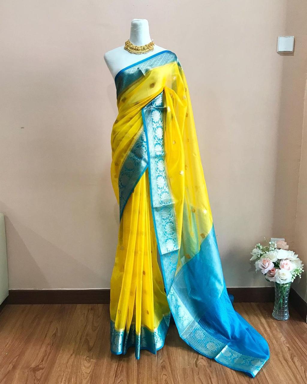 Yellow with sky blue Banarasi kora organza sarees