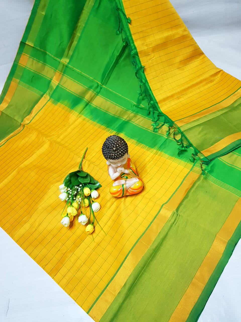 Yellow and green Tripura silk mahanati checks sarees