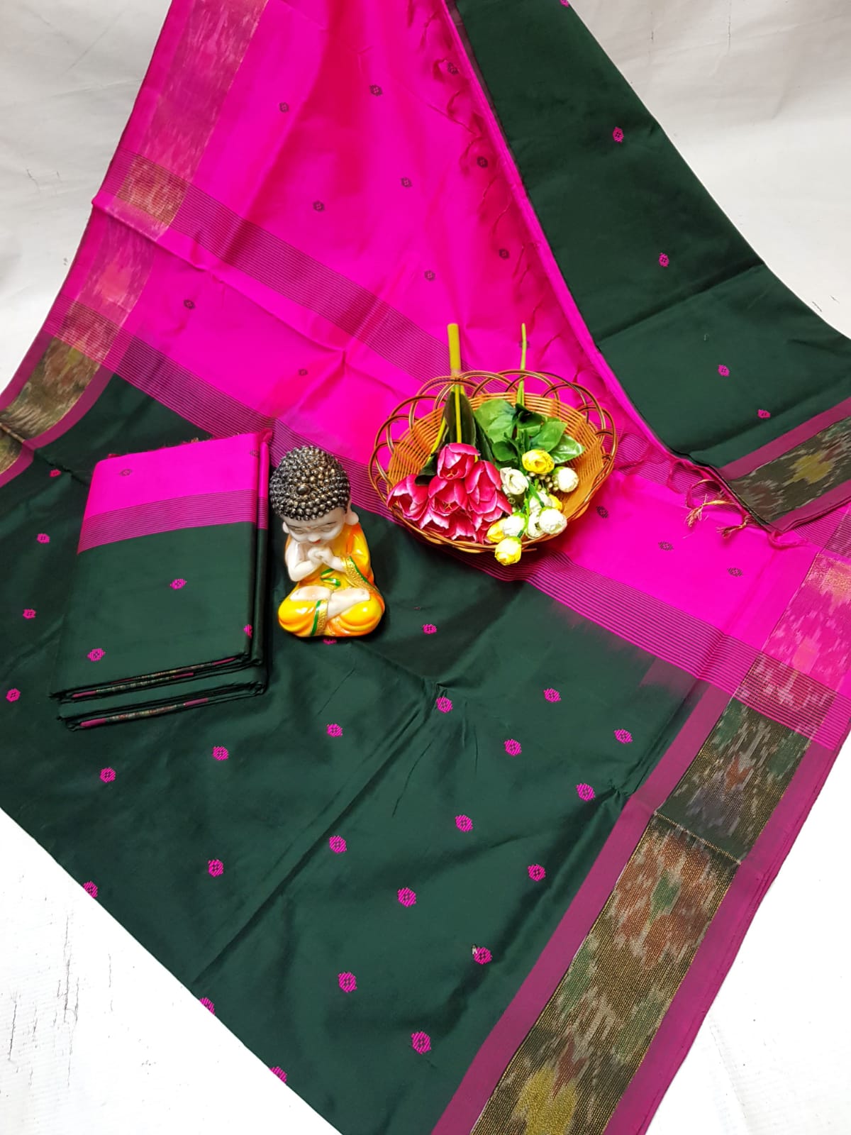 Bottle green Tripura silk sarees with Pochampally border