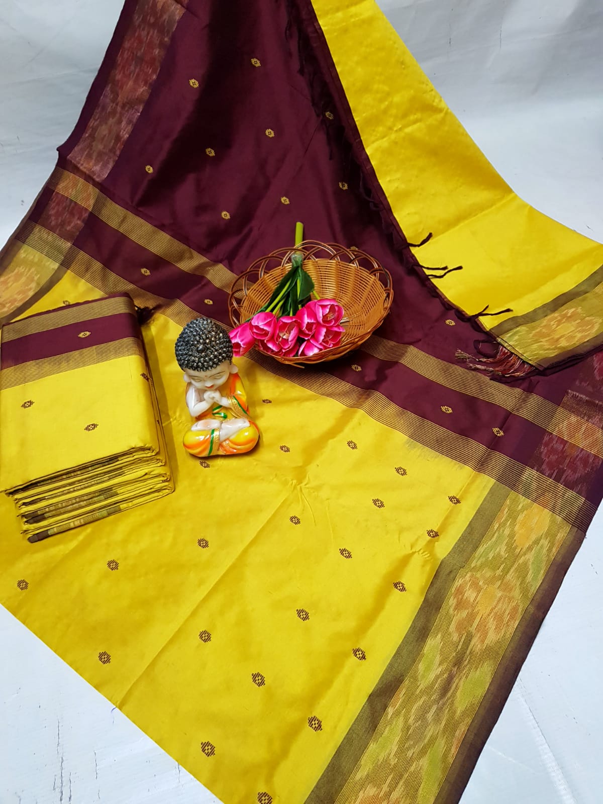 Yellow and chocolate brown Tripura silk sarees with Pochampally border