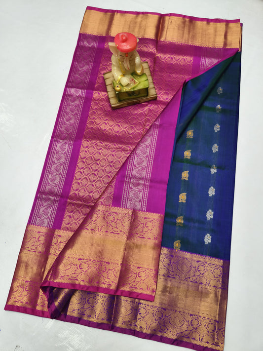 Navy blue uppada silk sarees with kanchi border