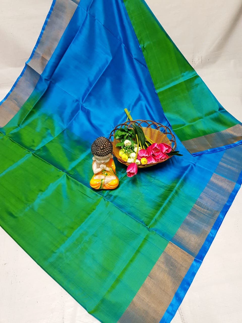 Green and light blue uppada plain silk sarees