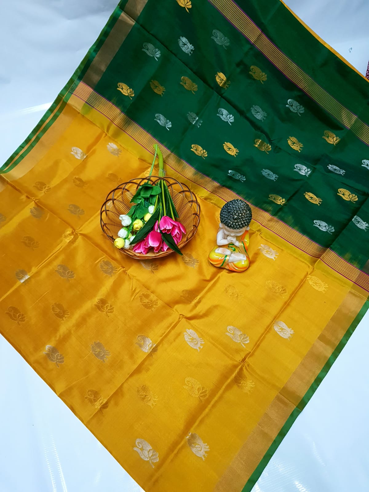 Yellow and green handloom Uppada silk sarees with small border