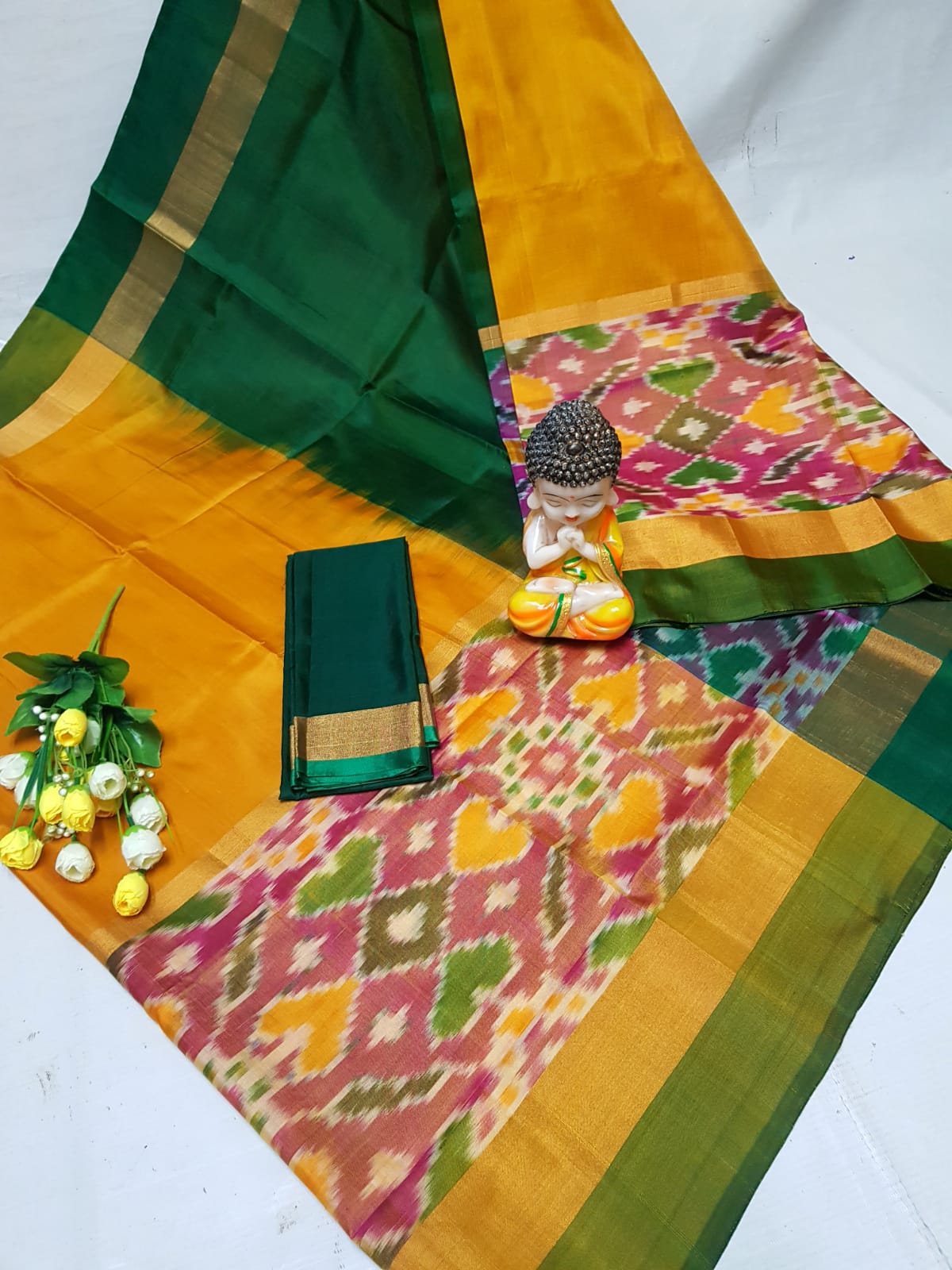 Mango yellow Uppada sarees with big pochampally border