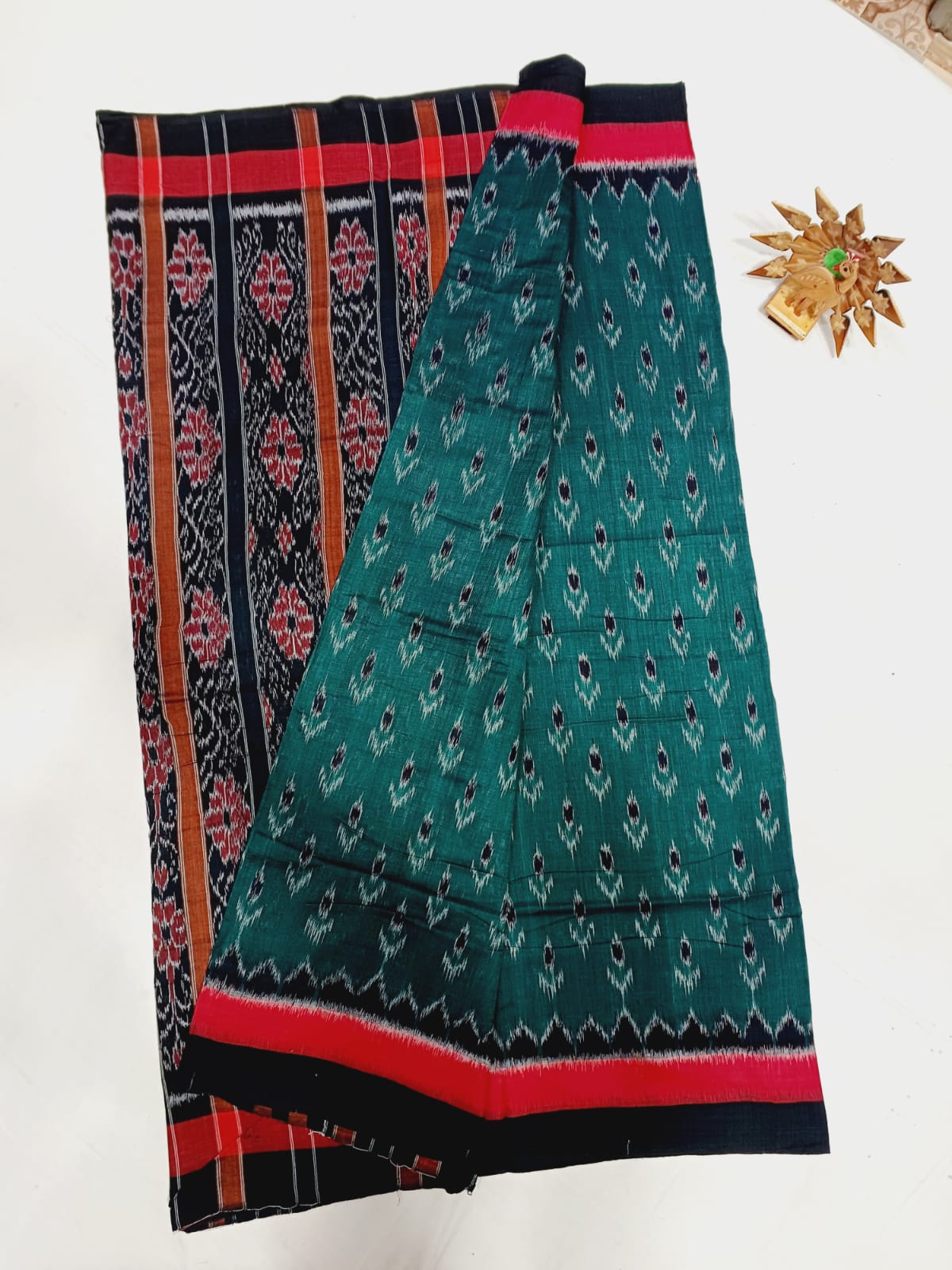 Peacock green ikkat mercerised Cotton sarees