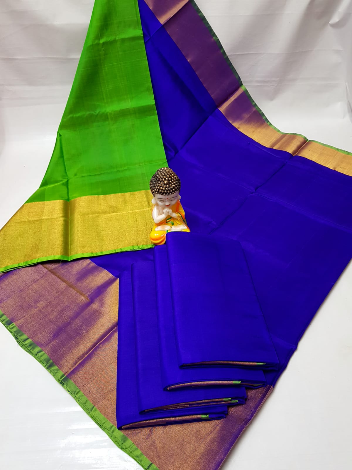 Royal blue and green Uppada big border sarees