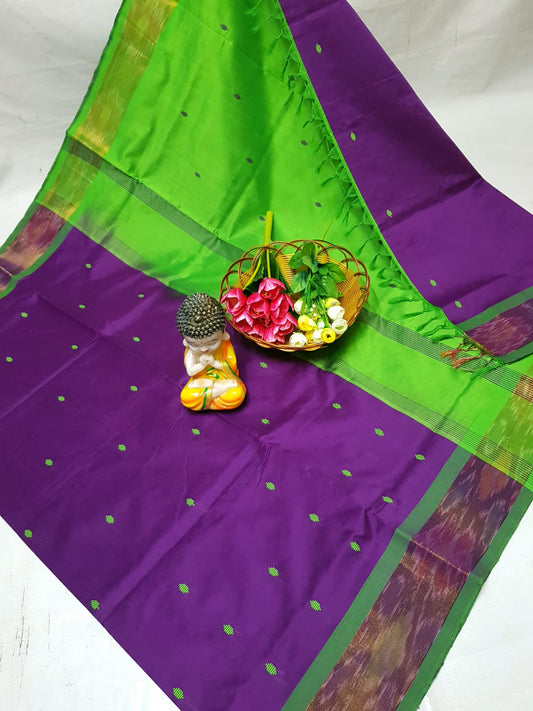 Dark purple and green Tripura silk sarees with Pochampally border