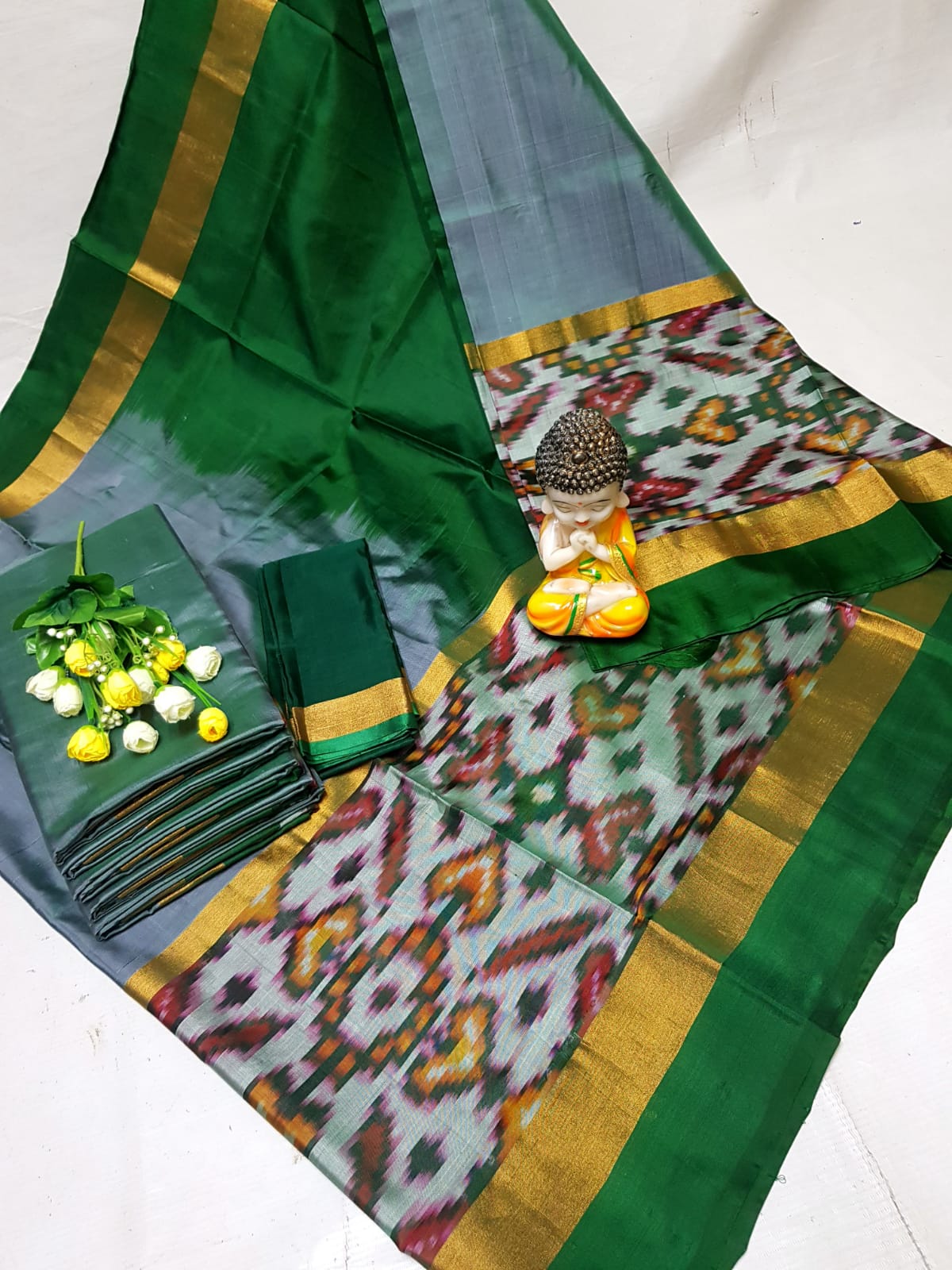 Grey and green Uppada sarees with big pochampally border