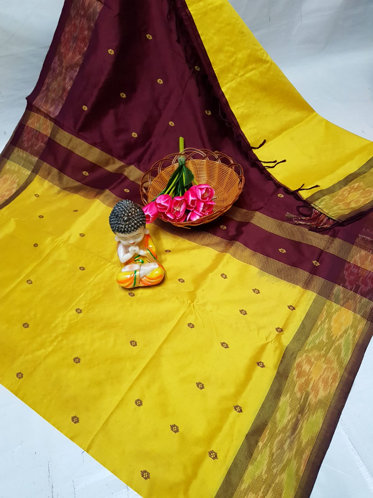 Yellow and chocolate brown Tripura silk sarees with Pochampally border