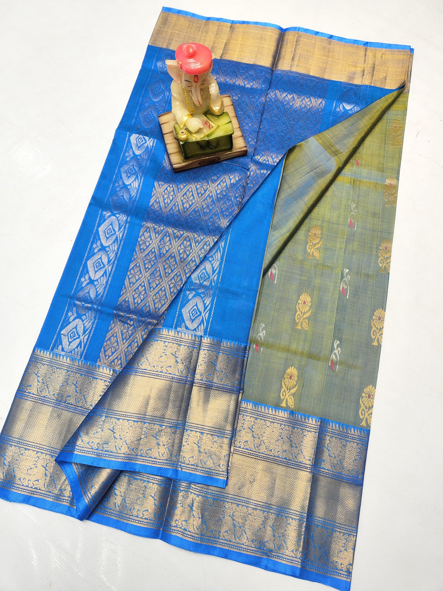 Green and sky blue uppada silk sarees with kanchi border