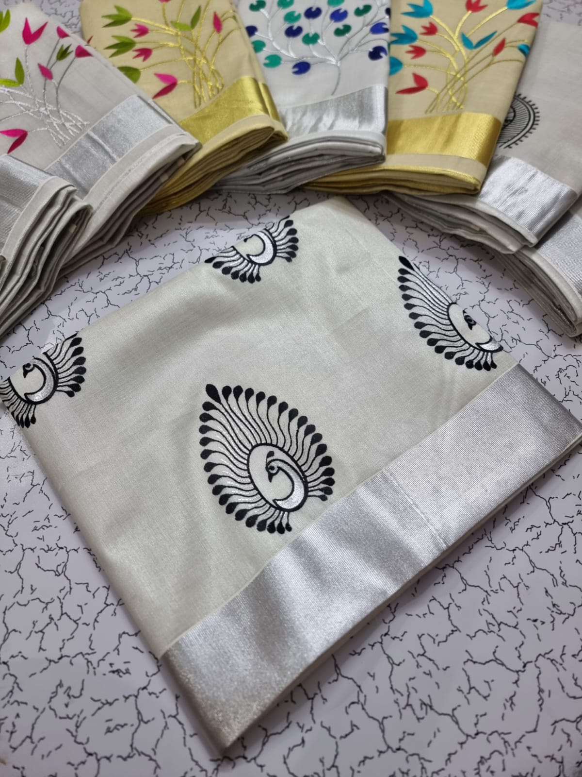 Onam Kerala silver tissue embroidery sarees