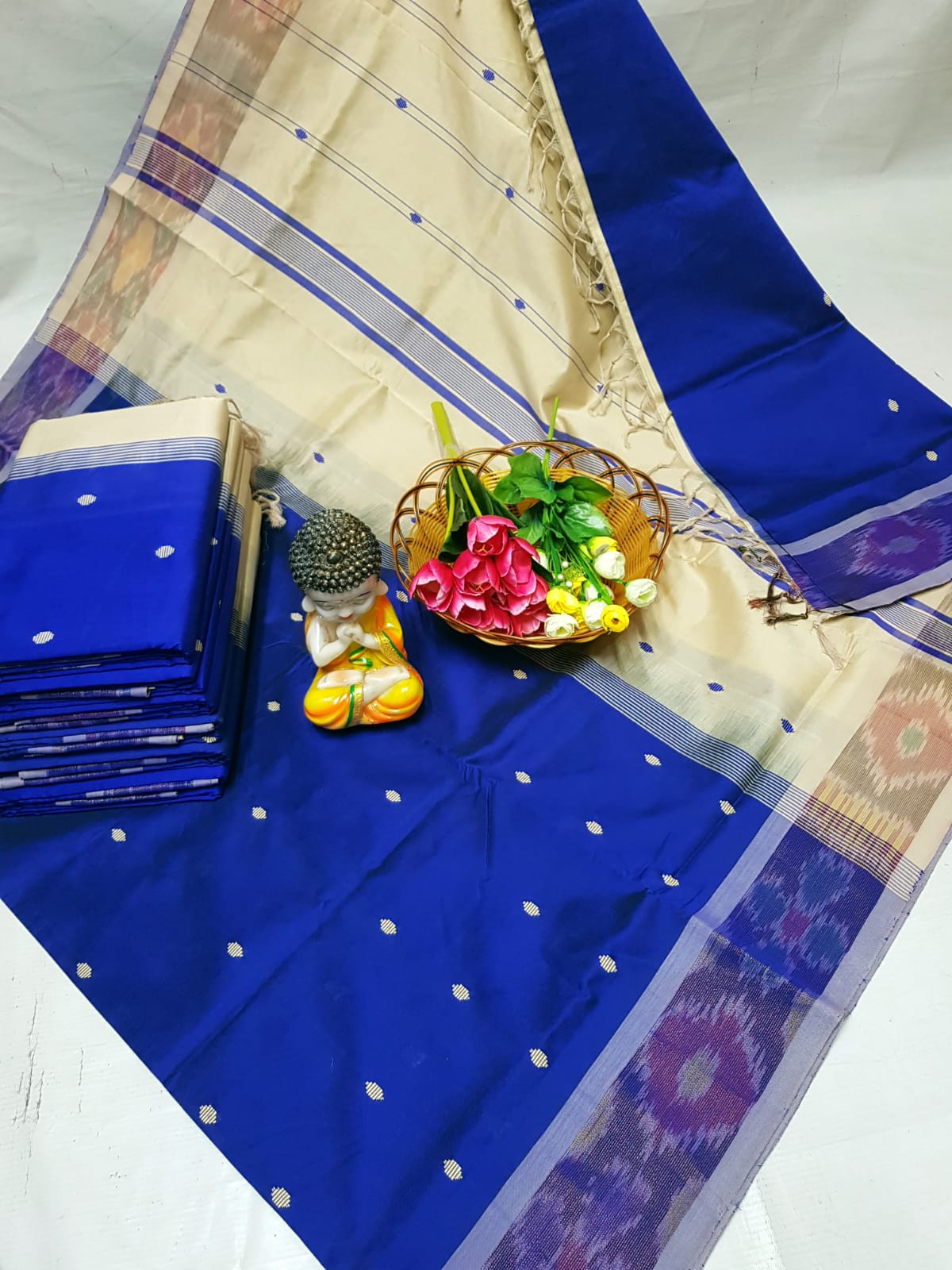 Royal blue Tripura silk sarees with Pochampally border