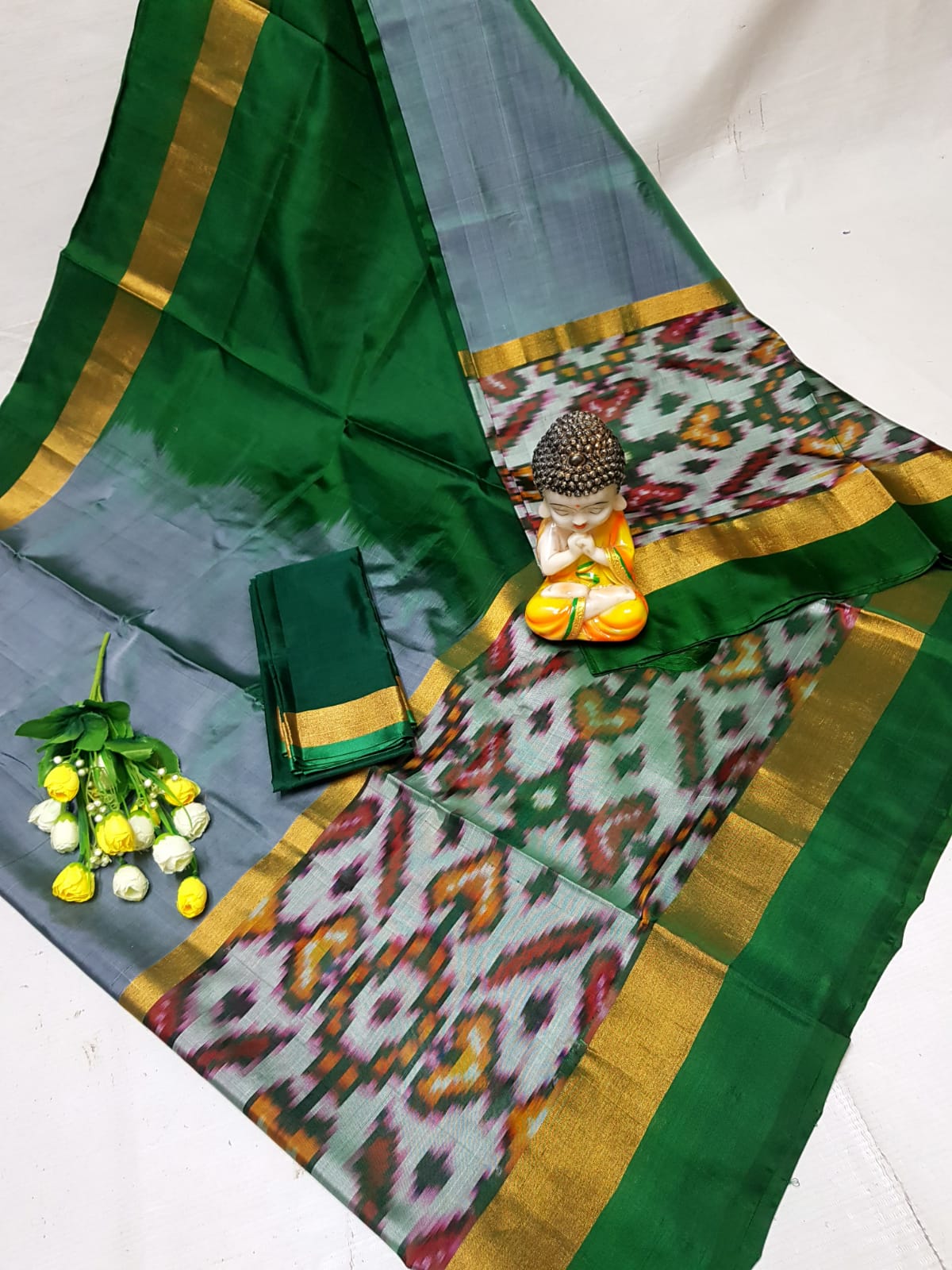 Grey and green Uppada sarees with big pochampally border