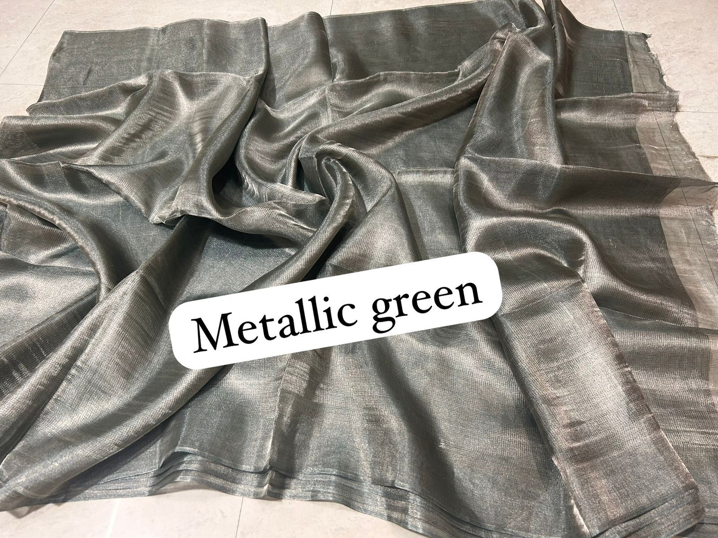 Metallic green Pure handloom Tussar tissue silk sarees