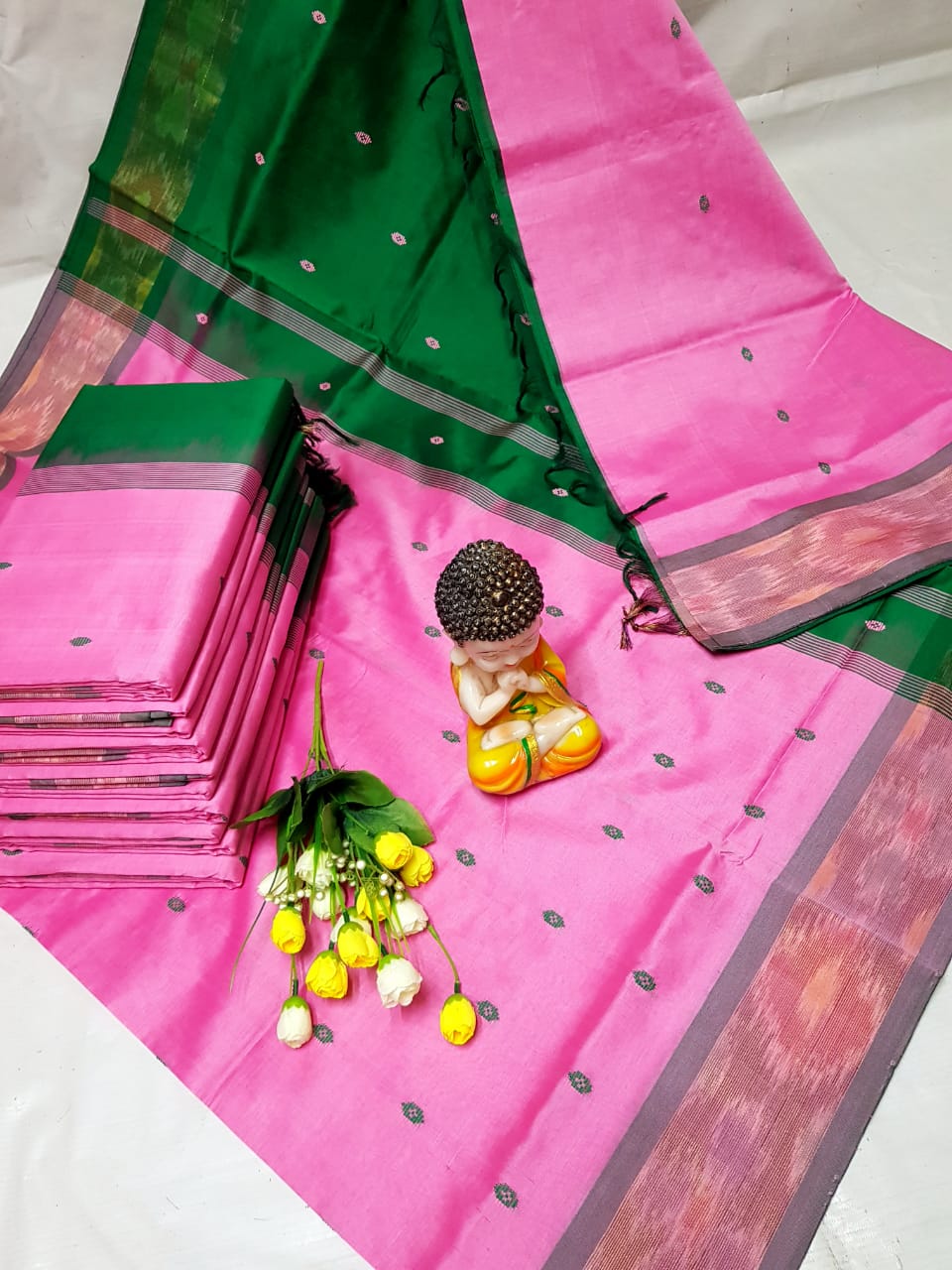 Fuchsia pink and dark green Tripura silk sarees with Pochampally border