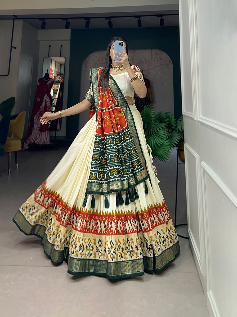 Cream and dark green lehenga choli