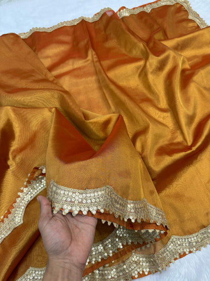 Gold Banarasi tissue silk sarees with cutwork lace border