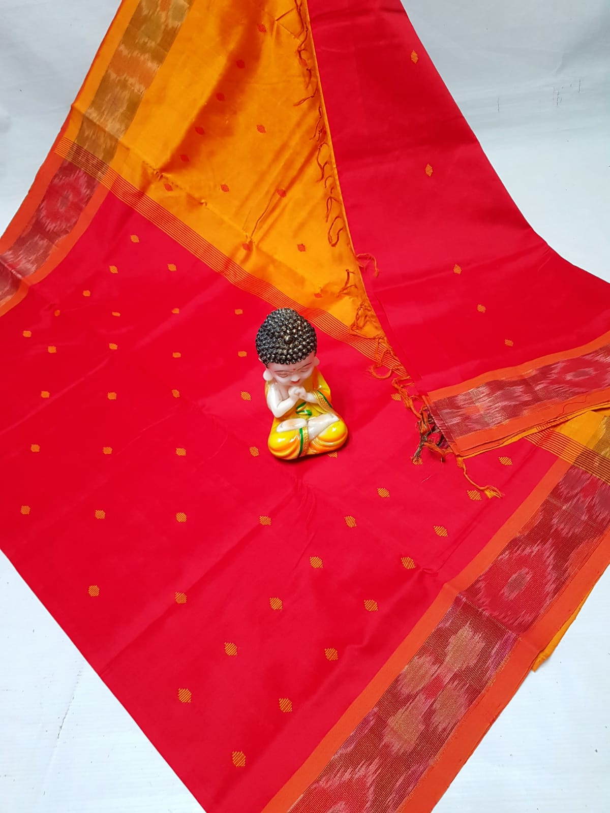 Red and yellow Tripura silk sarees with Pochampally border