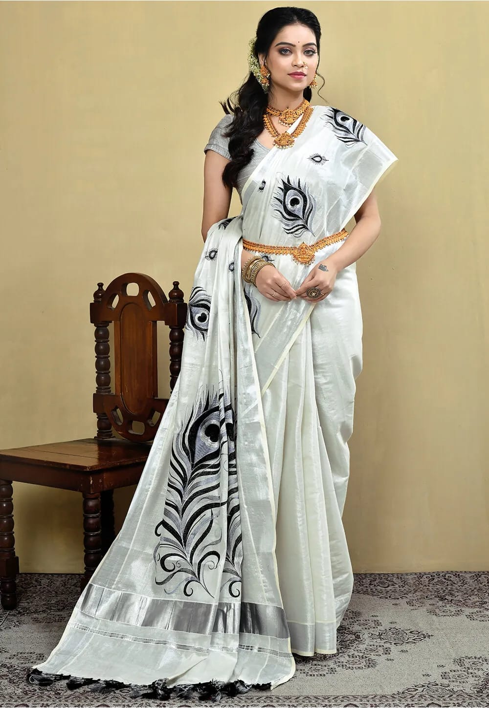 Onam Kerala silver tissue peacock feather embroidery sarees