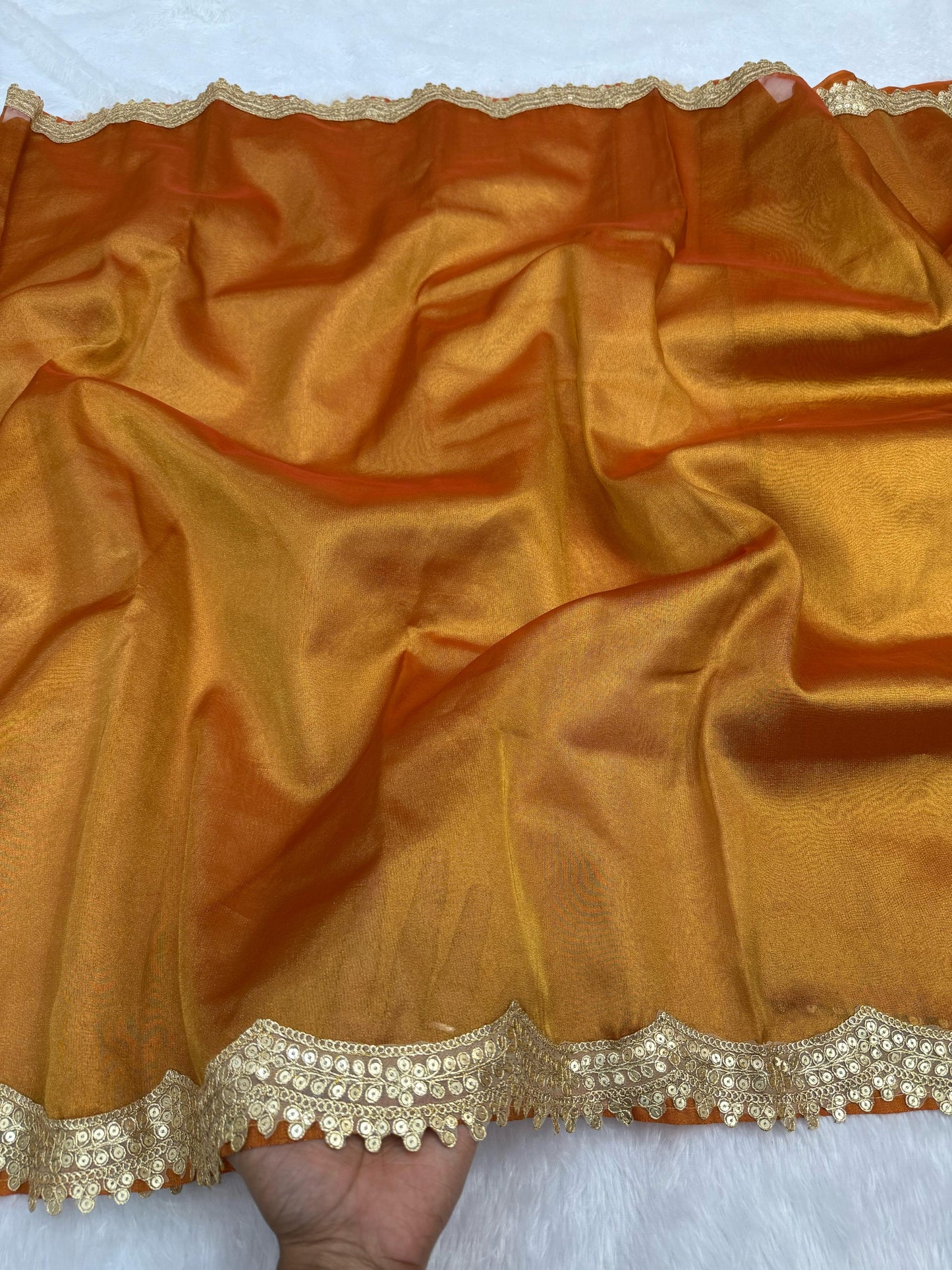 Gold Banarasi tissue silk sarees with cutwork lace border