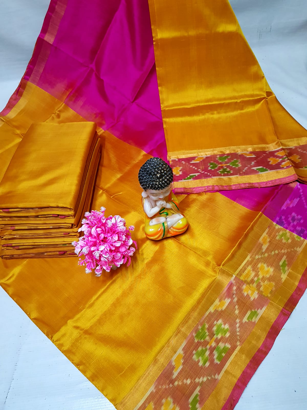 Mango yellow Uppada sarees with small pochampally border