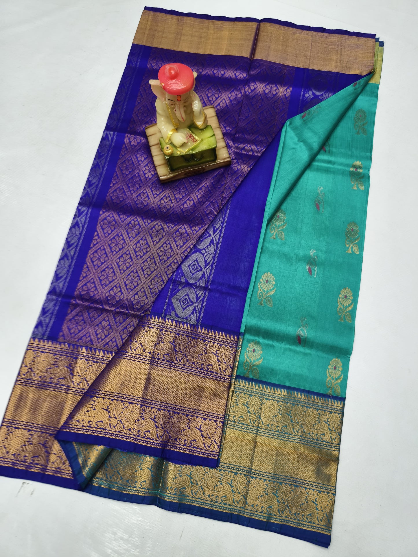 Sea green uppada silk sarees with kanchi border