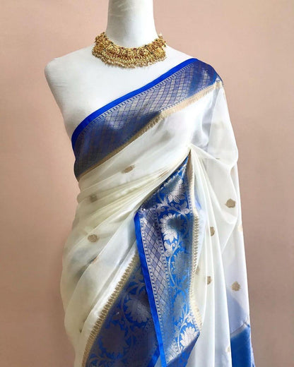 Cream with dark blue Banarasi kora organza sarees