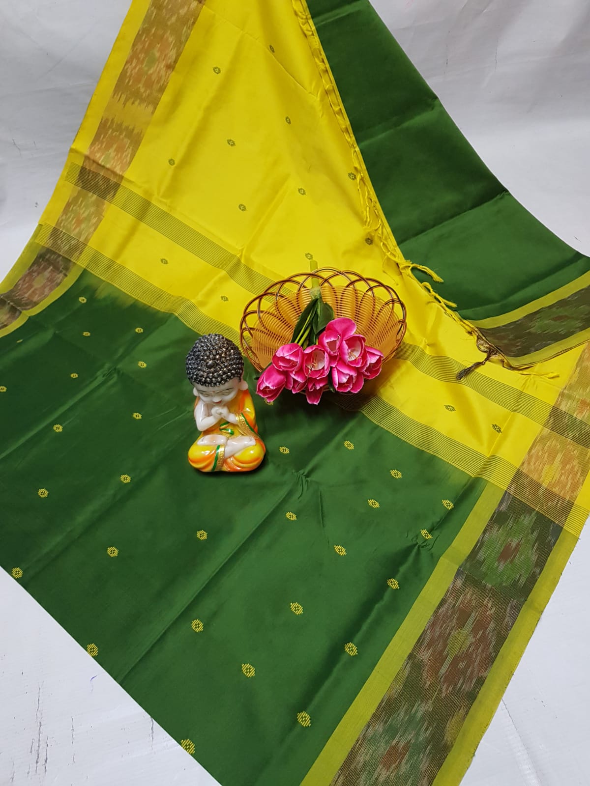 Dark green and yellow Tripura silk sarees with Pochampally border