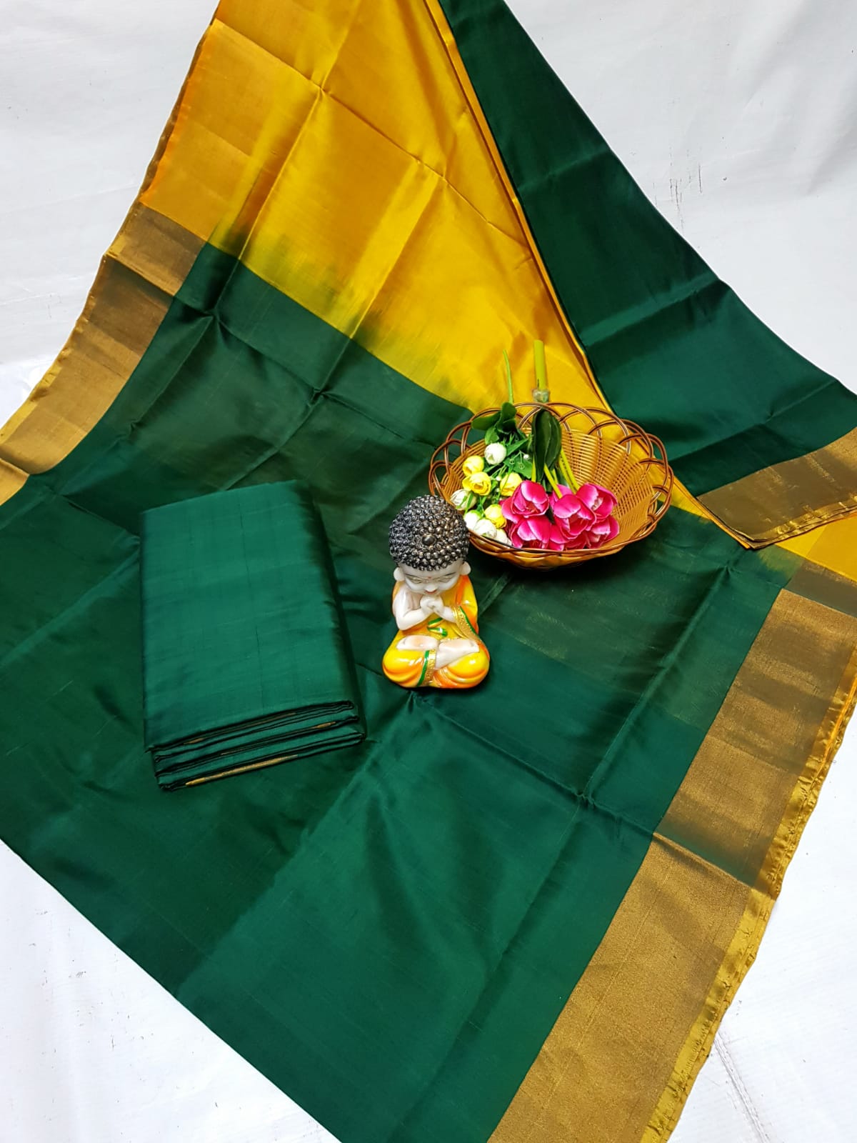 Dark green uppada plain silk sarees