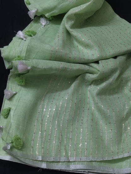 Pastel green linen striped sarees