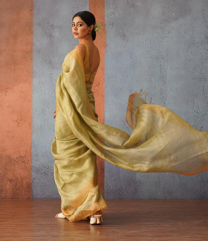 Pastel yellow festive wear silk linen sarees