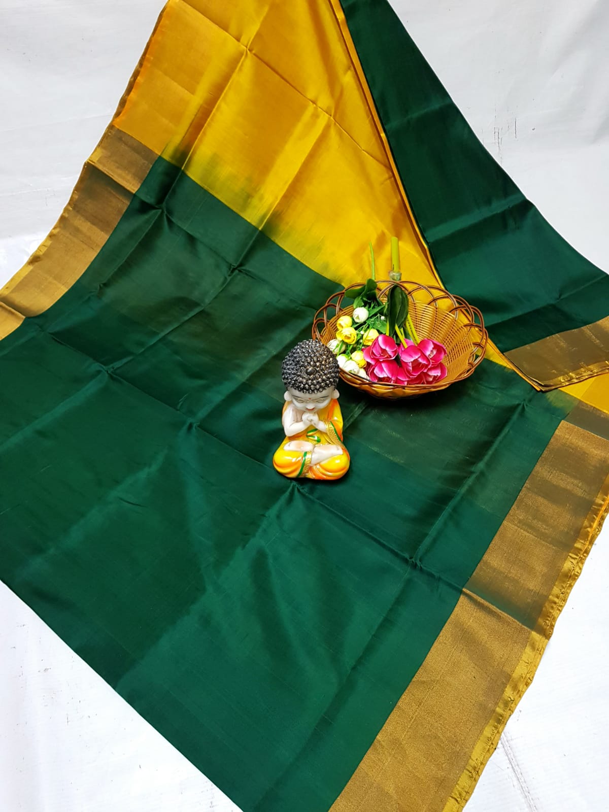 Dark green uppada plain silk sarees