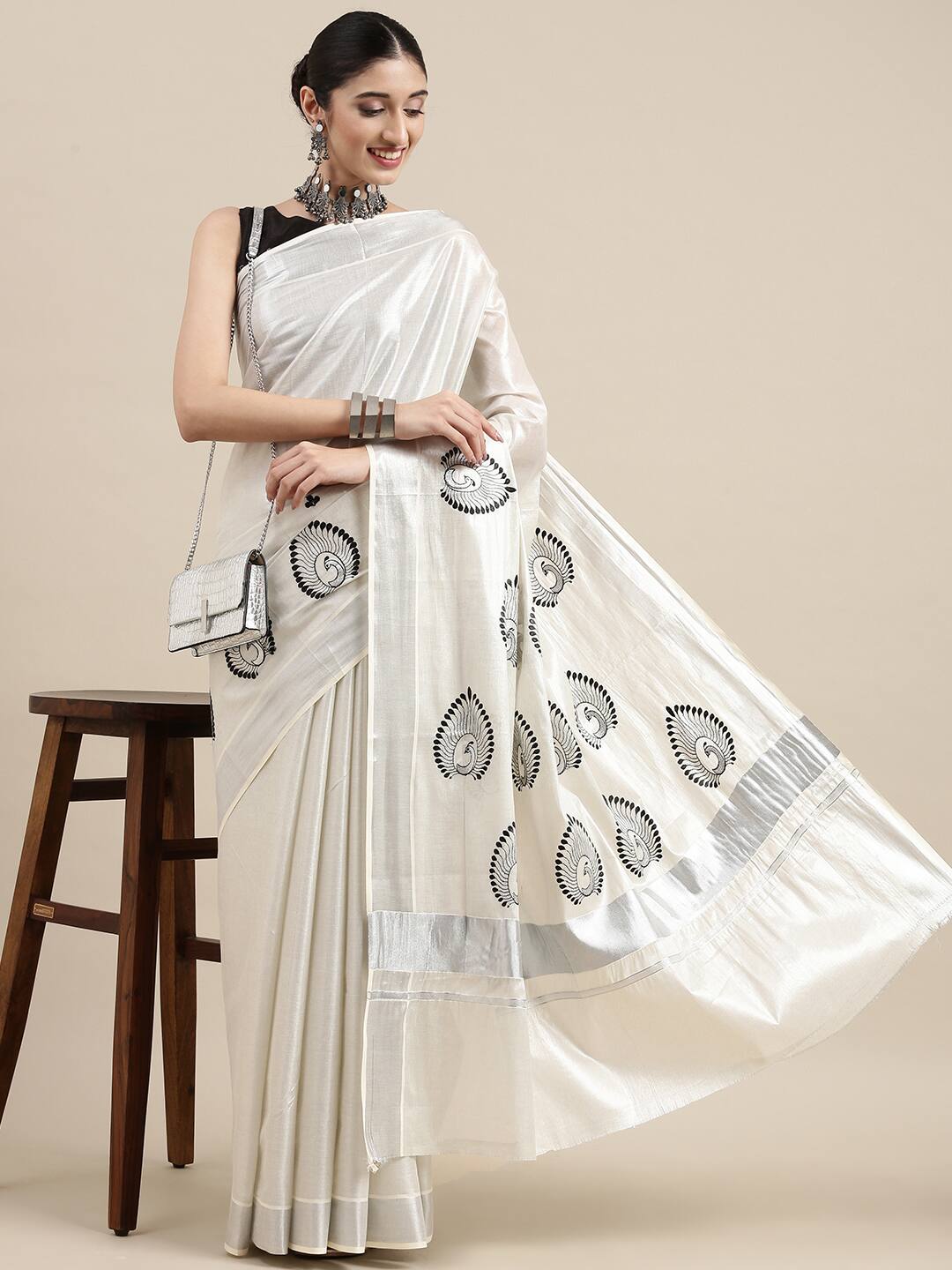 Onam Kerala silver tissue embroidery sarees