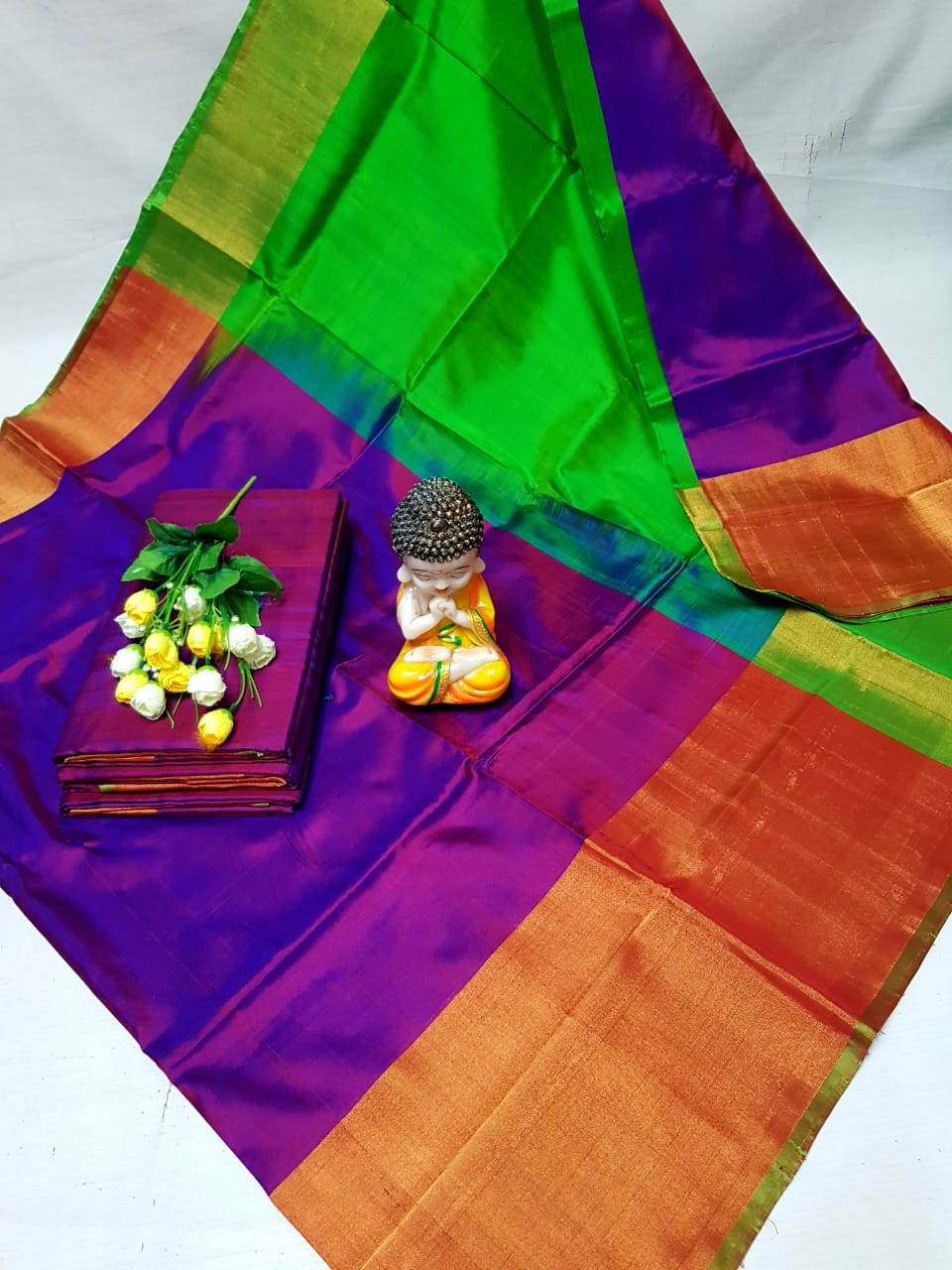 Dark purple and green Uppada big border sarees