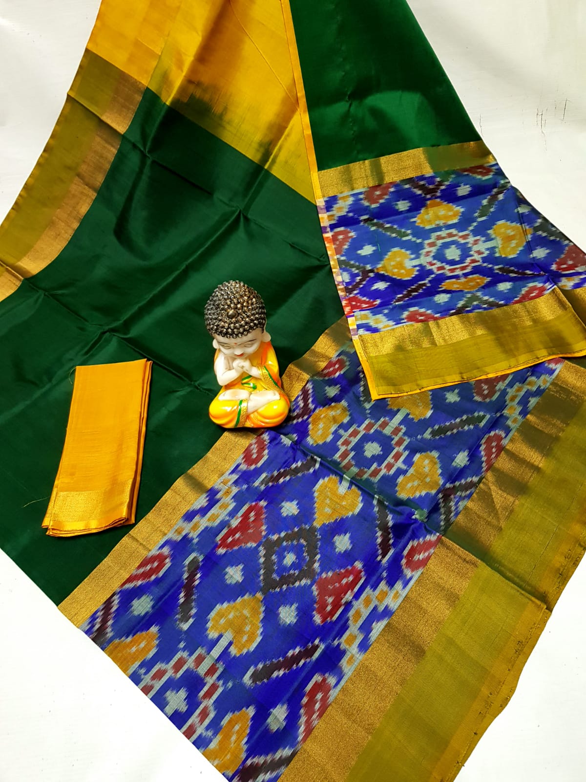 Dark green Uppada sarees with big pochampally border