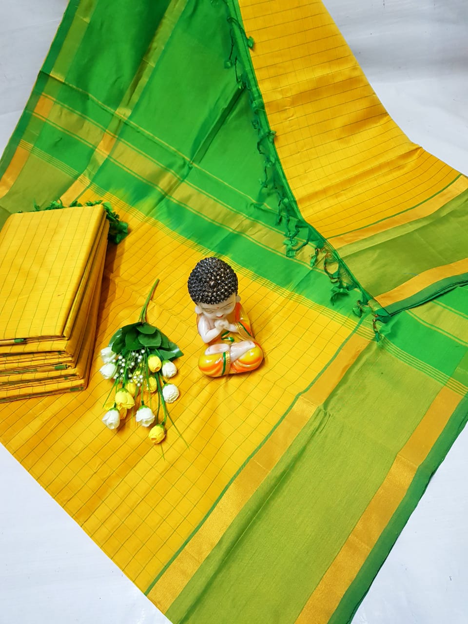 Yellow and green Tripura silk mahanati checks sarees