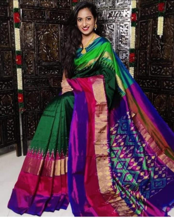 Dark green pochampally ikkat silk sarees