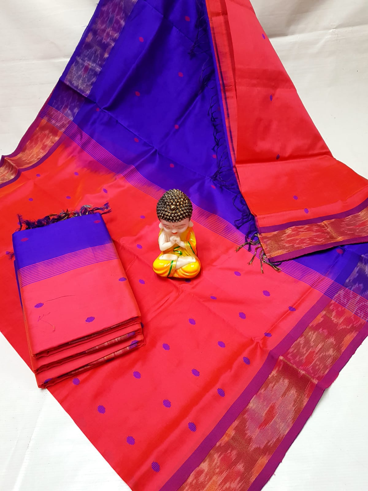 Red and blue Tripura silk sarees with Pochampally border