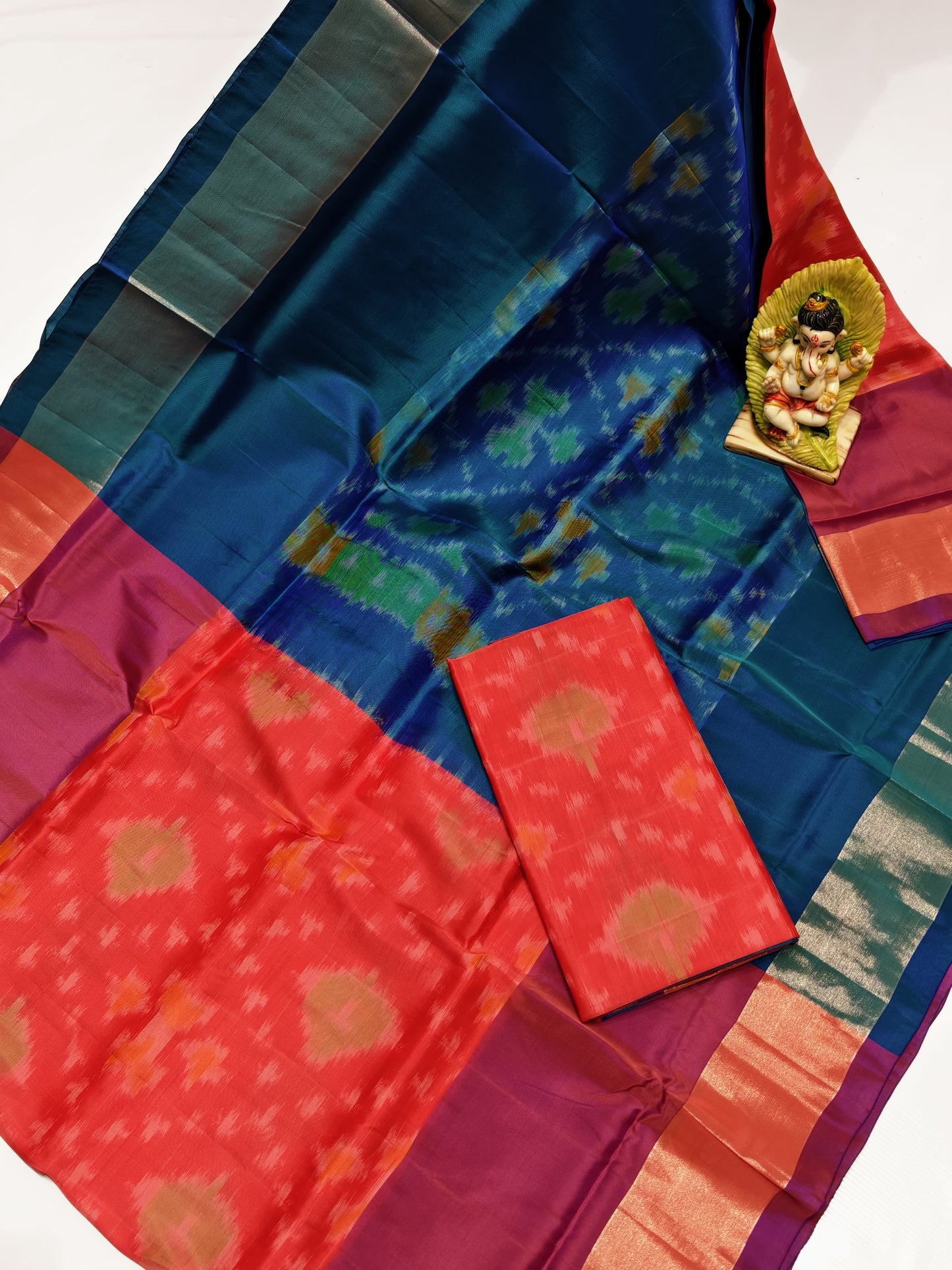 Orange and peacock blue Uppada soft silk sarees