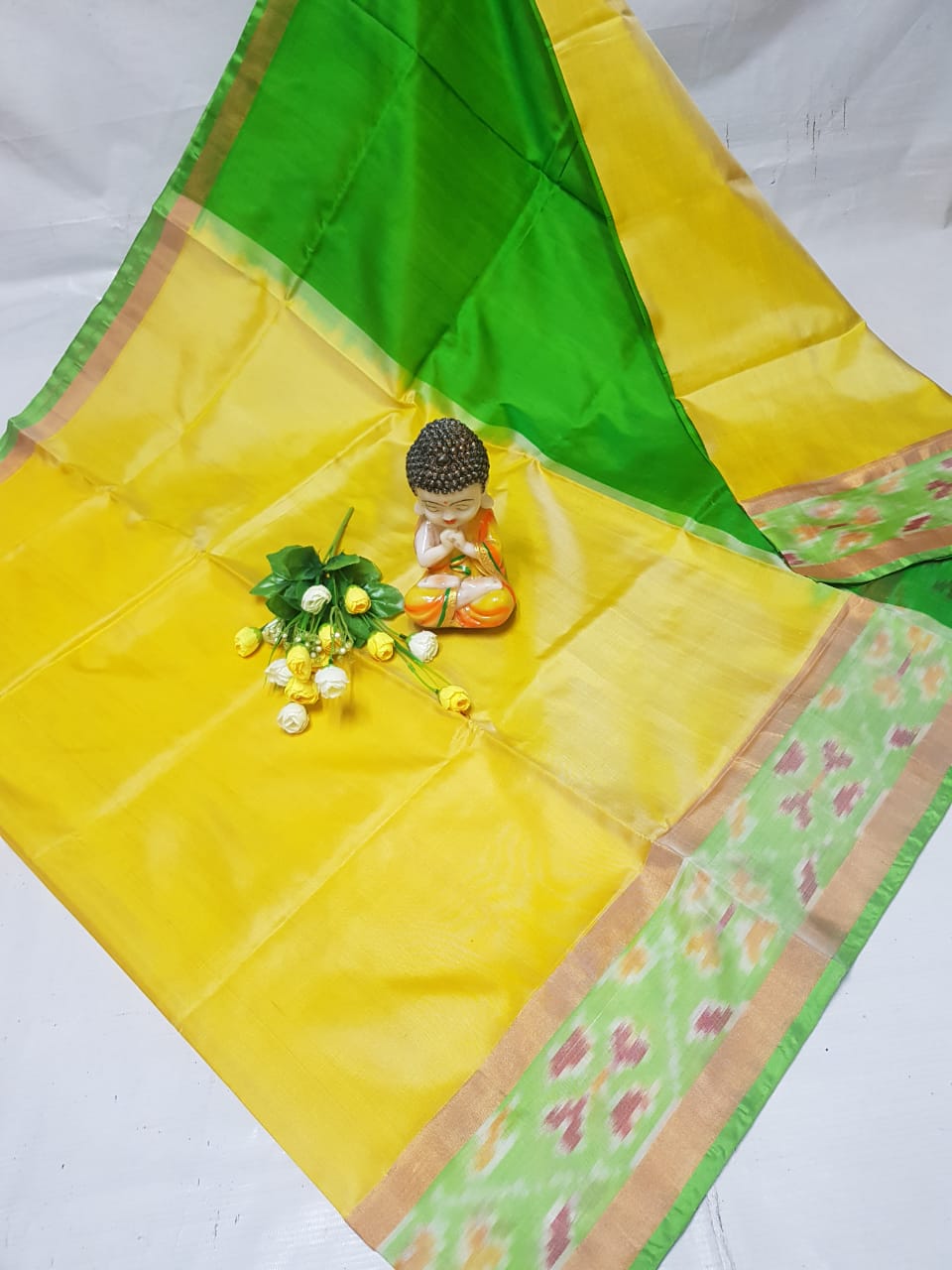 Light yellow Uppada sarees with small pochampally border