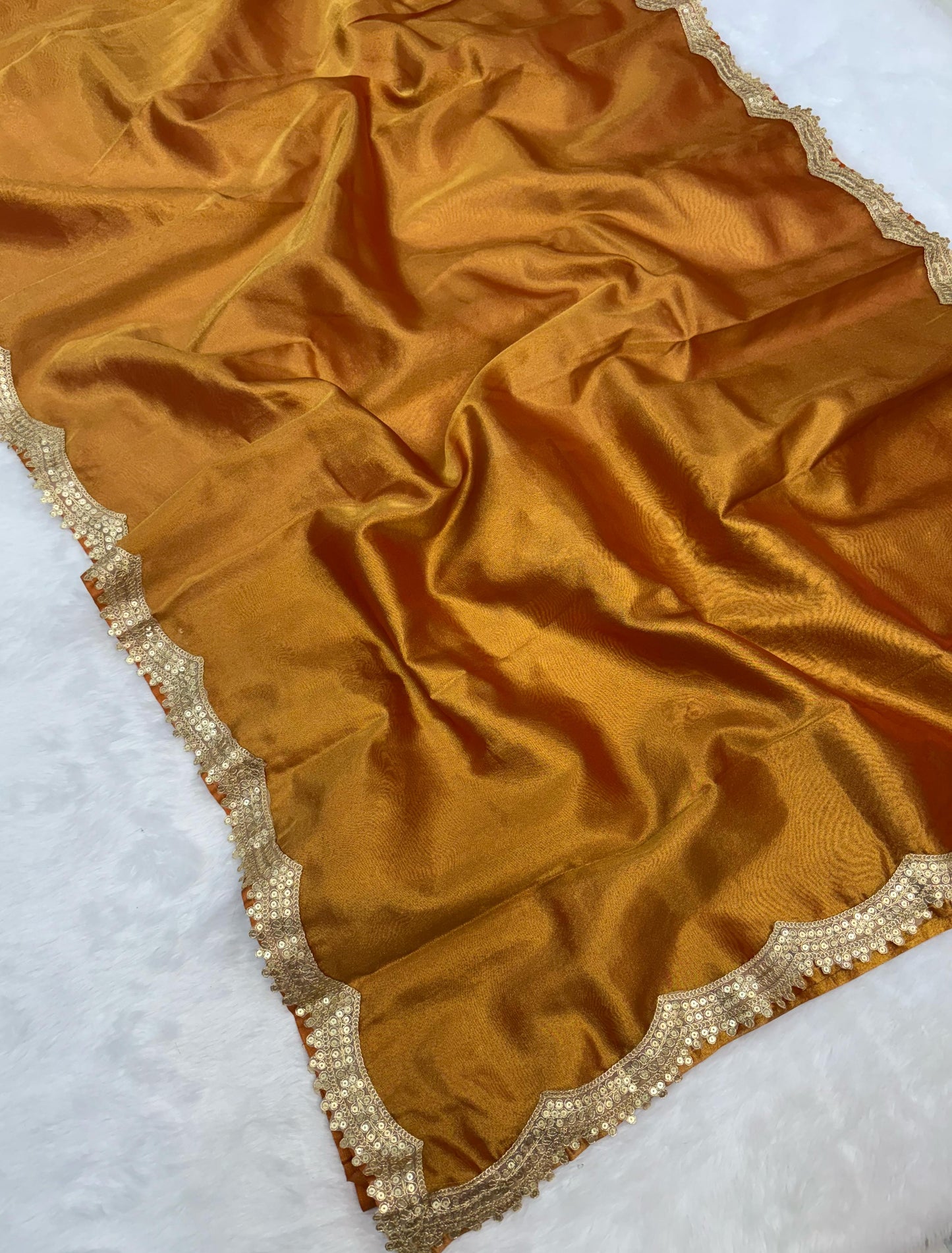 Gold Banarasi tissue silk sarees with cutwork lace border