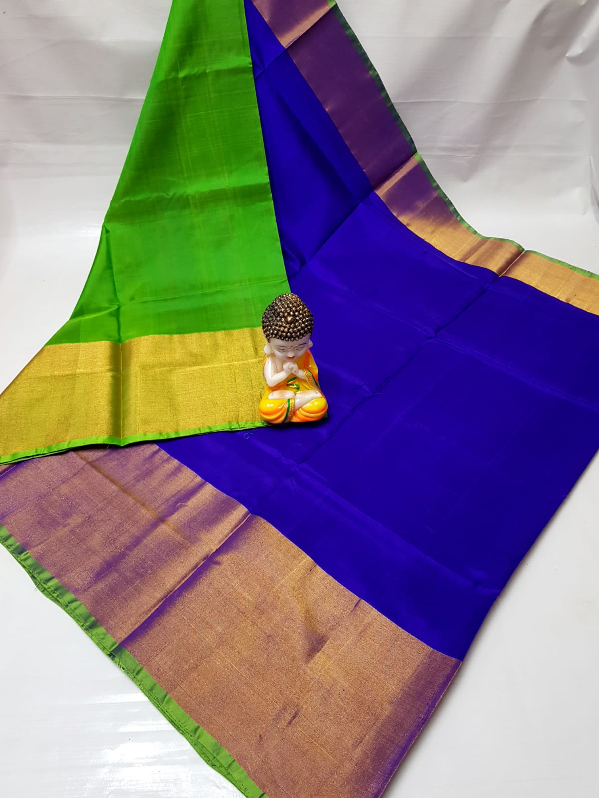 Royal blue and green Uppada big border sarees