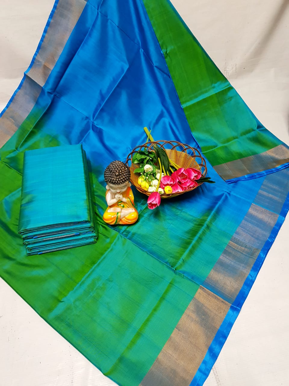 Green and light blue uppada plain silk sarees