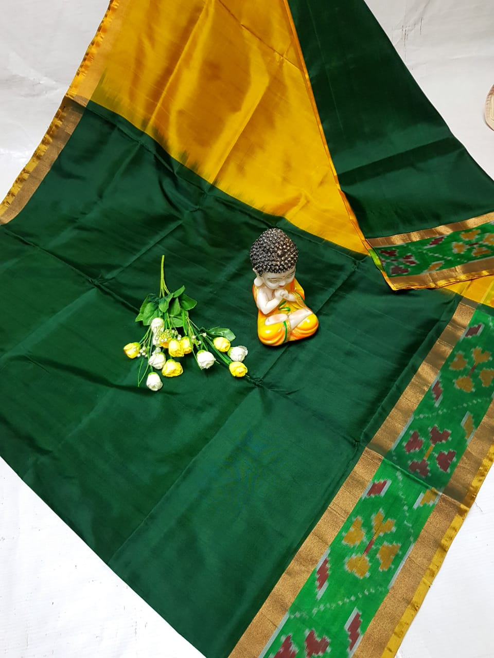 Bottle green Uppada sarees with small pochampally border