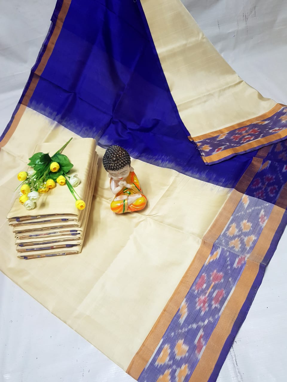 Cream Uppada sarees with small pochampally border