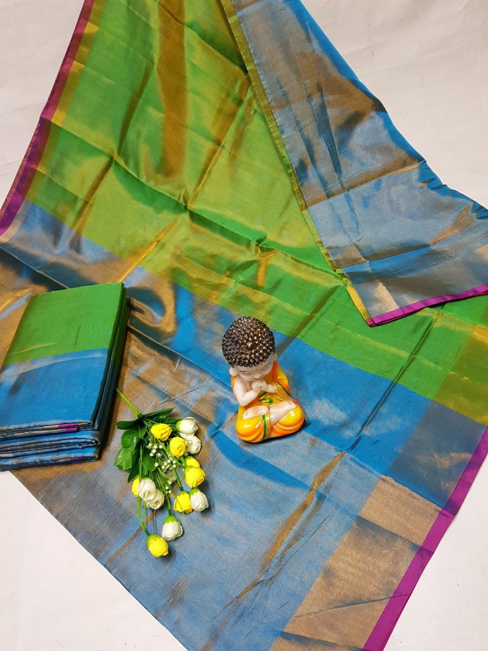 Light blue and green Uppada tissue sarees