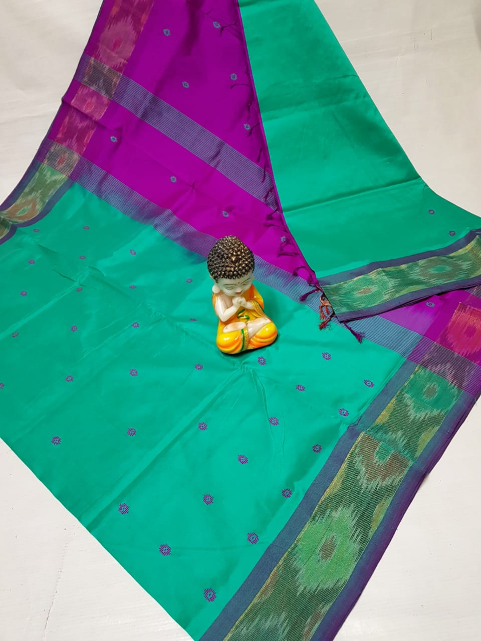 Turquoise and dark purple Tripura silk sarees with Pochampally border