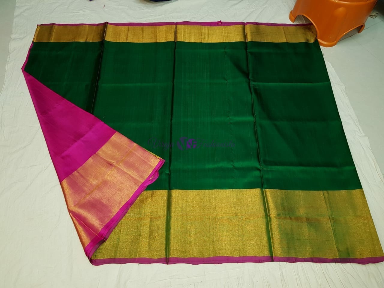Dark green and pink uppada sarees with big border